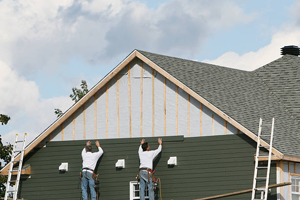 Professional Emergency Siding Repair technician working in Wayne, IL